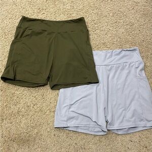 2 pairs of Women's Olive and Light Gray Shorts. L/XL both with pockets.